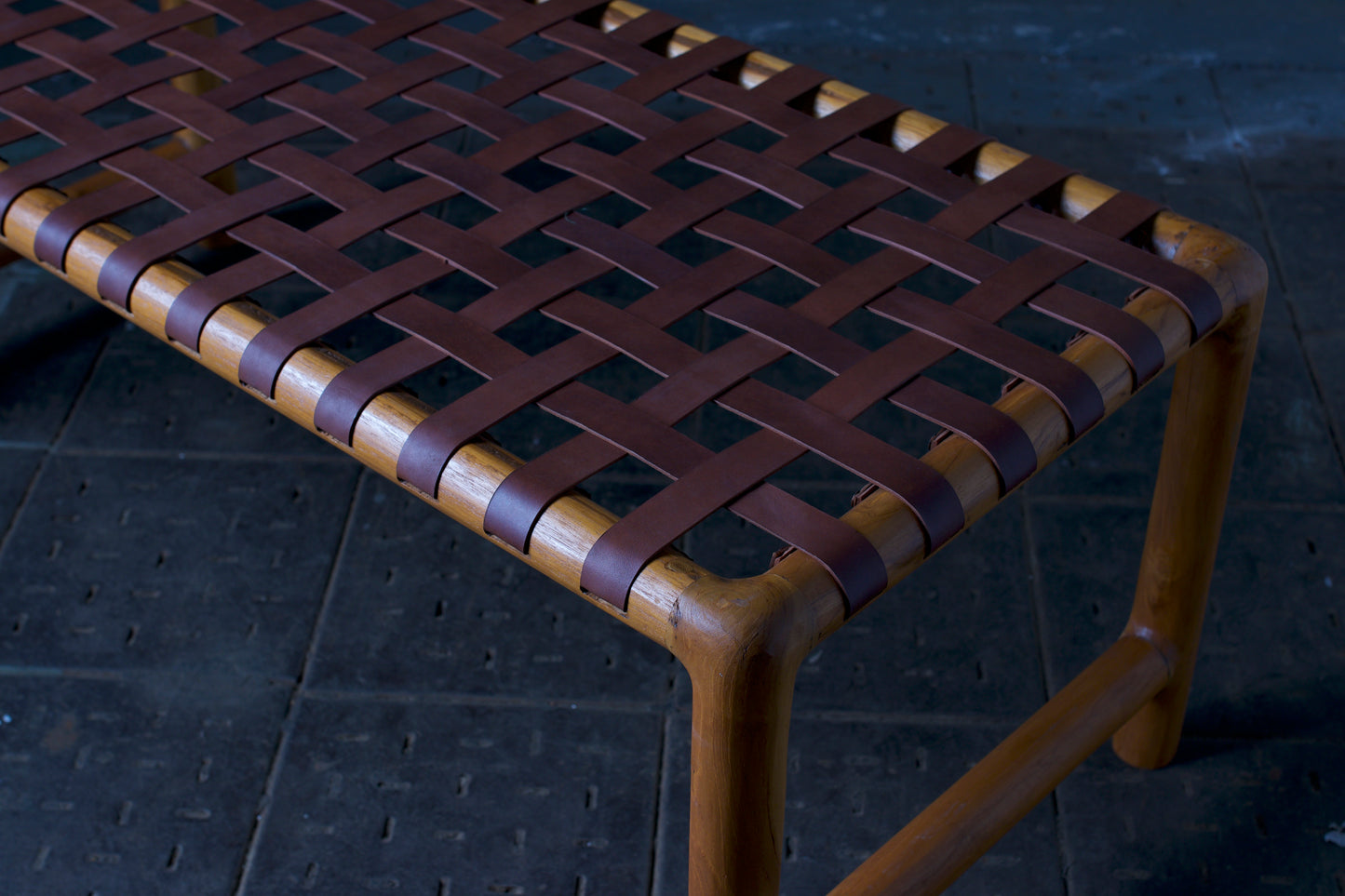 Leather strap round leg bench