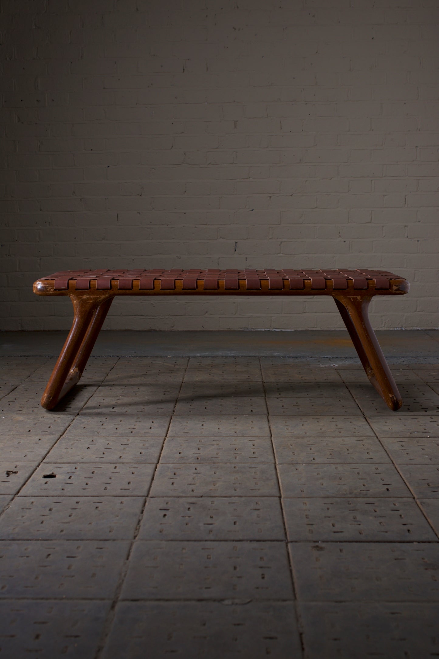 Leather strapped bench