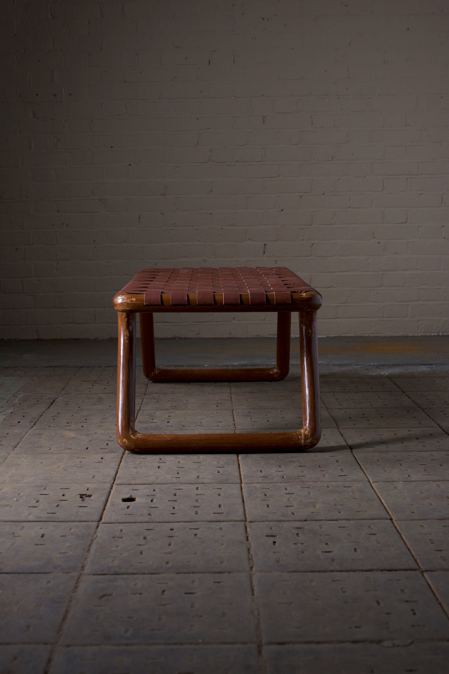 Leather strapped bench
